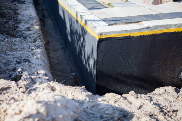 Professional Exterior Waterproofing technician working in Edgewater, NJ